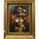 A gilt framed still life oil on board of flowers, frame size 44 x 54cm.