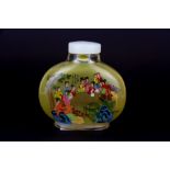 A 1960's Chinese inside painted snuff bottle of court ladies in a garden with extensive