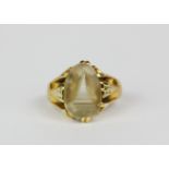 A very rare yellow metal, tested high carat gold, Burmese ring inset with clear and banded banded