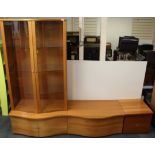 A contemporary bow front glazed cabinet with two matching side cabinets, W. 97cm H. 191cm.