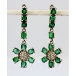 A pair of 925 silver oval cut emerald and white stone set drop earrings, L. 4.3cm.