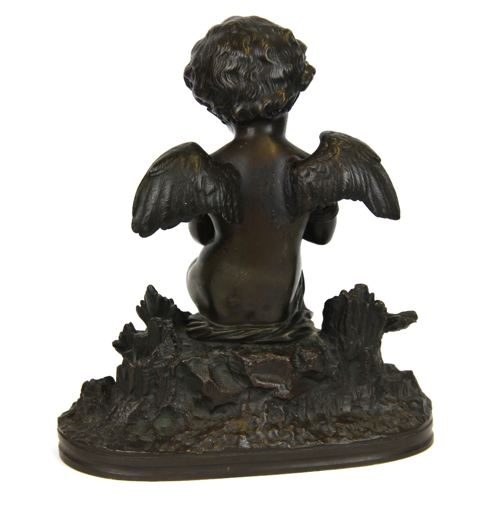 A 19th Century bronze figure of a cherub, H. 21cm. - Image 2 of 2