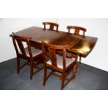 A 1930's oak draw leaf dining table, 108cm extending to 160cm, together with four Art Deco dining