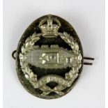 A First World War Tank Regiment badge.