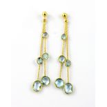 A pair of 925 silver gilt drop earrings set with faceted cut blue topaz, L. 6.5cm.