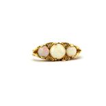 An antique 9ct yellow gold (worn hallmark) opal and diamond set ring, (M).