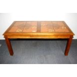 A 1970's ceramic tile topped coffee table, 98 x 53 x 43cm.