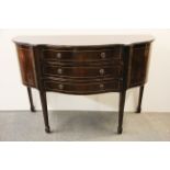 A serpentine fronted mahogany regency style sideboard, W. 134cm. H. 91cm.
