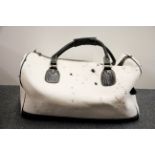 An interesting contemporary leather and cowhide travel bag, 55 x 27 x 30cm.