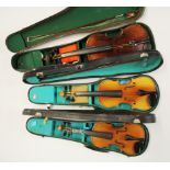 Three cased violins including two children's.