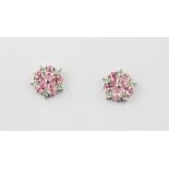 A pair of 925 silver stone set stud earrings, Dia. 1cm.