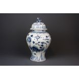 A 19th/ early 20th Century Chinese hand painted and incised porcelain jar and lid, H. 33cm.