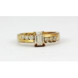 A 9ct yellow gold stone set ring, (N.5).
