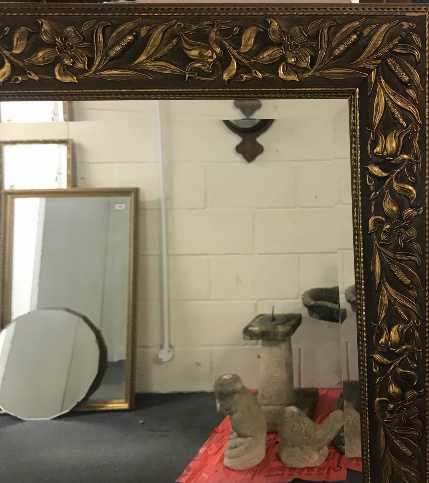 A large gilt framed bevelled glass mirror, 106 x 137cm. - Image 2 of 2