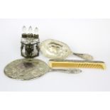 A 19th Century three bottle perfume set, H. 12cm. Together with a three piece silver plated dressing