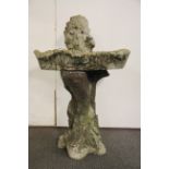 A vintage concrete bird bath, H. 78cm. W. 83cm.