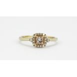 An 18ct white gold ring set with an 0.35ct princess cut natural fancy light pink diamond