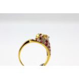 A 925 silver gilt ruby and diamond set panther shaped ring, (P).