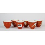 An unusual set of six mid 20th Century Chinese octagonal porcelain tea bowls matching the tea pot in