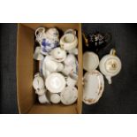 An extensive box of German and other dinner and tea porcelain.