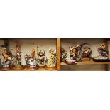 A group of 12 porcelain Native American figurines, by the American Indian heritage foundation museum