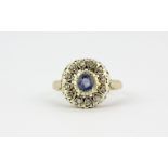 A 9ct yellow gold sapphire and diamond set cluster ring, (K).