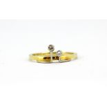 A 14ct yellow and white gold (stamped 585) diamond set ring, (O).