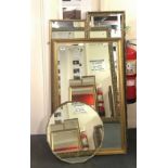 Three gilt framed bevelled glass mirrors and an art deco circular mirror, largest 63 x 104cm.