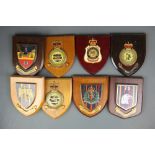 A group of military wooden shields, H. 17.5cm.