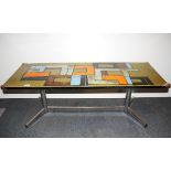 A 1970's tile topped metal framed coffee table, with removable protective corners , 121 x 46cm.