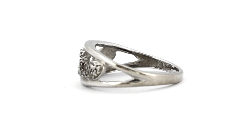 A 9ct white gold (stamped 10k) diamond set hearts ring, (M). - Image 2 of 2