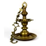 An 18th/19th Century Nepalese bronze temple hanging oil lamp. L. 60cm