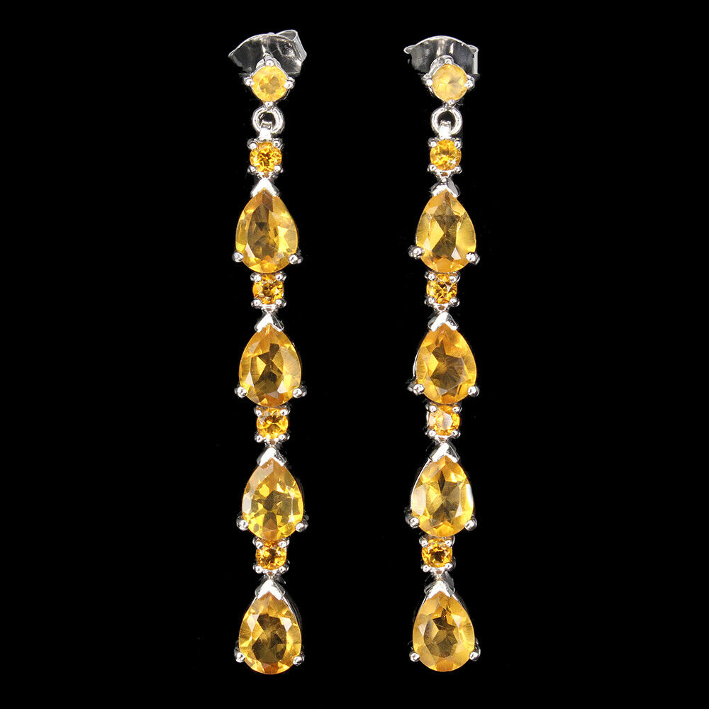 A pair of 925 silver drop earrings set with pear and round cut citrines, L. 5cm.