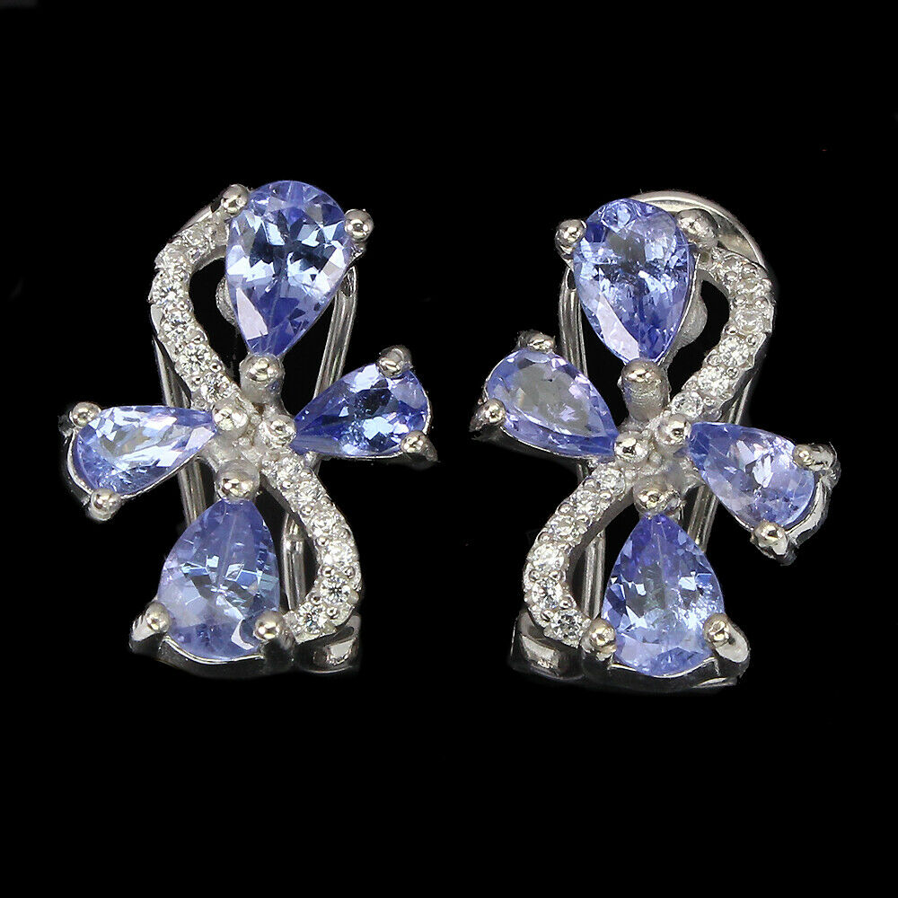 A pair of 925 silver earrings set with pear cut tanzanites and white stones, L. 1.5cm.