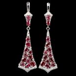 A pair of 925 silver drop earrings set with oval cut rubies and white stones, L. 5cm.