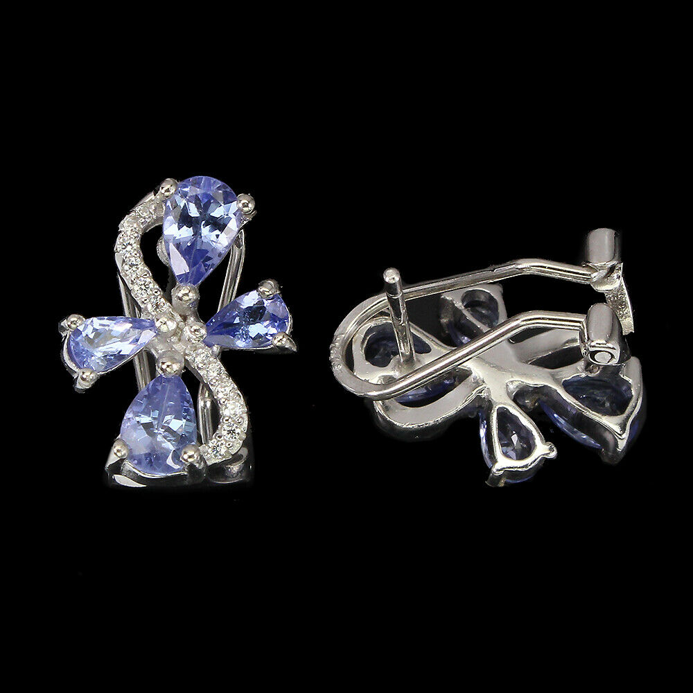 A pair of 925 silver earrings set with pear cut tanzanites and white stones, L. 1.5cm. - Image 2 of 2