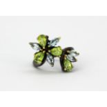 A 925 silver ring set with marquise cut blue topaz and pear cut peridots, (O.5).