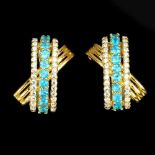A pair of 925 silver gilt earrings set with blue apatites and white stones, L. 1.5cm.