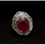 A 925 silver ring set with a large oval cut ruby surrounded by white stones, (N.5).