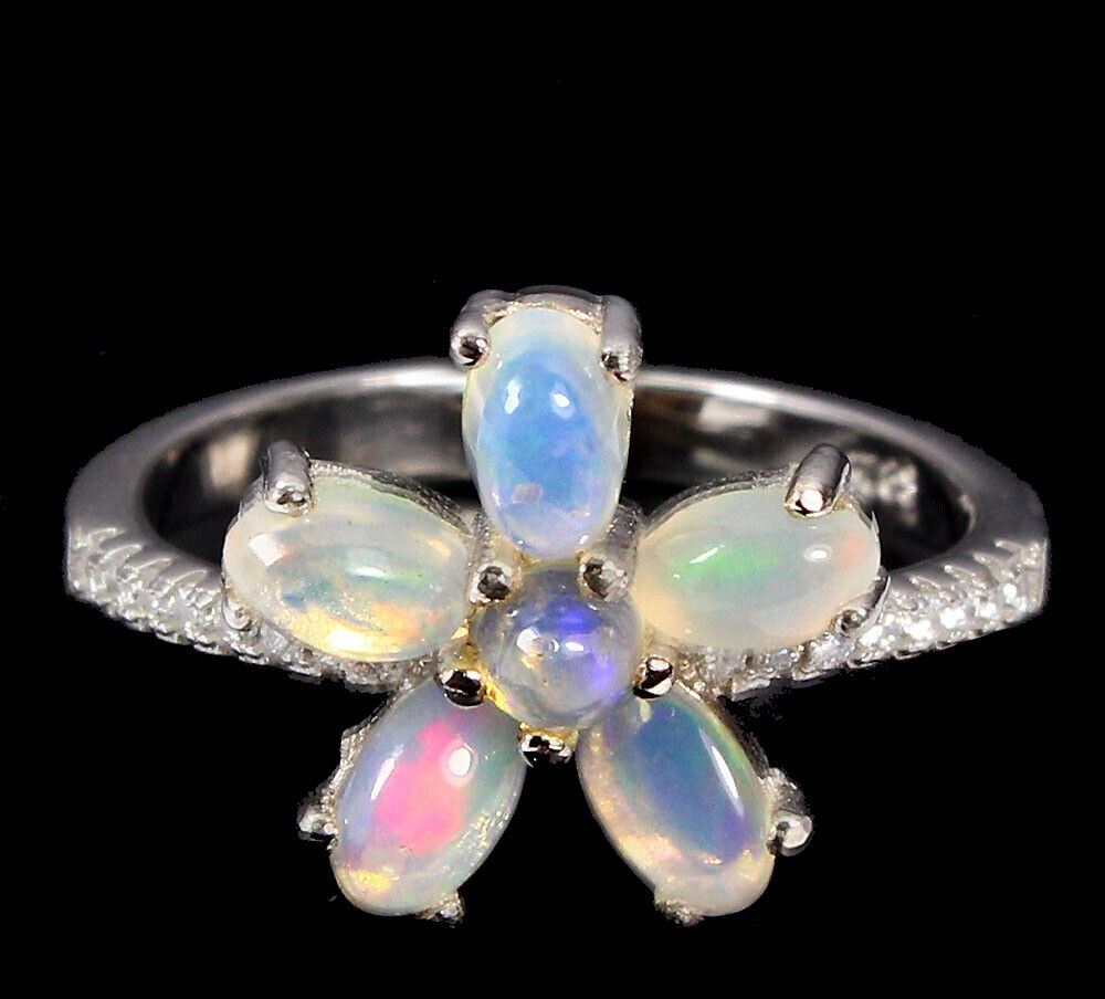 A 925 silver opal and white stone set ring, (O).