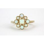 A 9ct yellow gold opal set ring, (N.5).