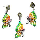 A pair of 925 silver and marcasite enamelled and ruby set butterfly shaped earrings and matching