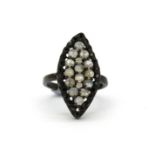 A 925 silver moonstone and black spinel ring, (O).