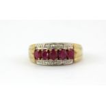 A 9ct yellow gold ruby and diamond set ring, (N).