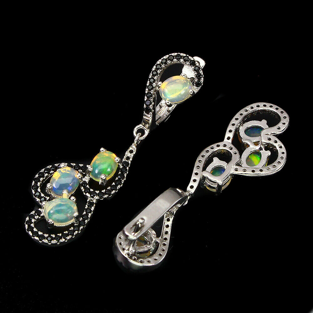 A pair of 925 silver drop earrings set with opals and black spinels, L. 30.4cm. - Image 2 of 2