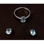 A pair of 925 silver stud earrings set with oval cut blue topaz and matching ring, (N.5).