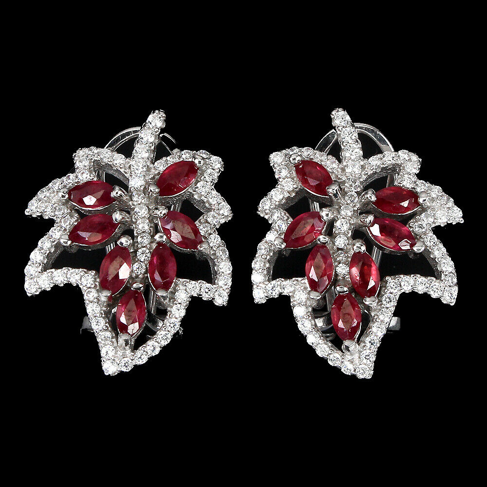 A pair of 925 silver leaf shaped earrings set with marquise cut rubies and white stones, L. 2cm.
