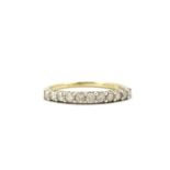 A 9ct yellow gold diamond set half eternity ring, (O).