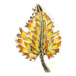 A 925 silver and marcasite enamelled leaf shaped brooch, L. 4.5cm.