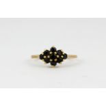 A 9ct yellow gold sapphire set cluster ring, (H).